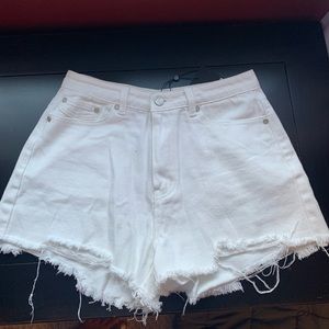 White distressed jean shorts